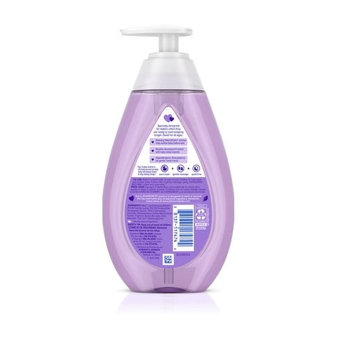 Un jabón de manos líquido transparente con aroma a lavanda en un envase morado transparente en forma de lágrima con dispensador blanco. El texto del envase dice "SLEEP" y "Bath & Body Works Aromatherapy".