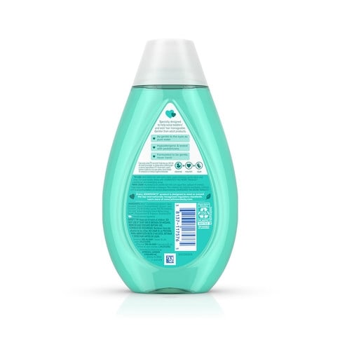 Un envase verde claro en forma de lágrima con la etiqueta "Equate Tear-Free Baby Shampoo", con una tapa blanca, sobre un fondo blanco liso. El texto de la etiqueta incluye "Delicado para los ojos" y "33.8 fl oz (1 L)".